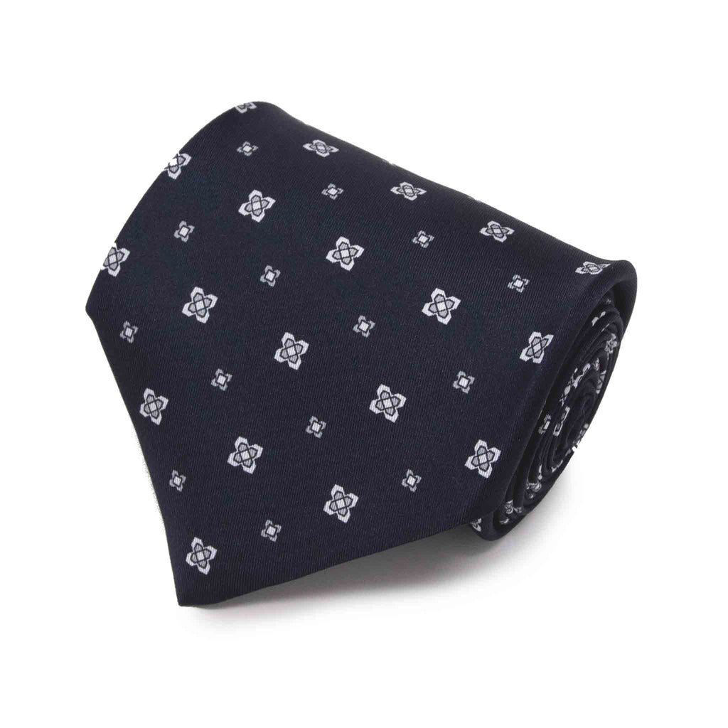 dark blue and white patterned silk tie